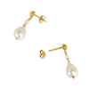 Gold and pearl drop earrings with stud fastenings on a white background.