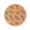 A round cork placemat with a dark grey olive branch pattern, featuring the brand name 'LIGA' printed near the bottom edge, set against a plain white background.