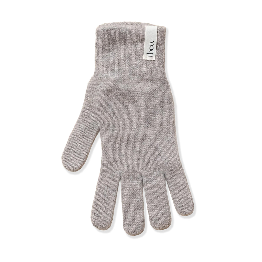 wool and cashmere blend gloves in a beige / oatmeal colour on a white background. 