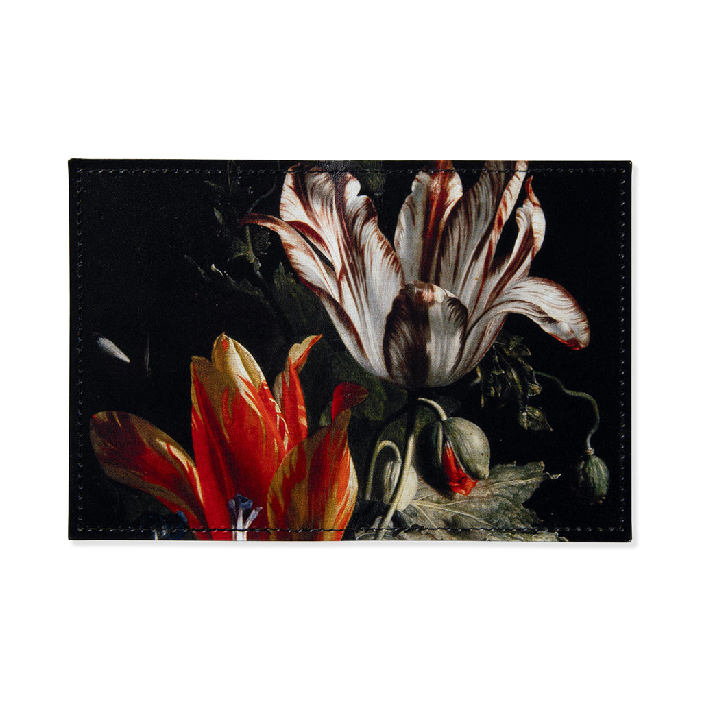 Leather wallet with floral design on a black background