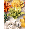 Colourful ceramic flowers on a white background