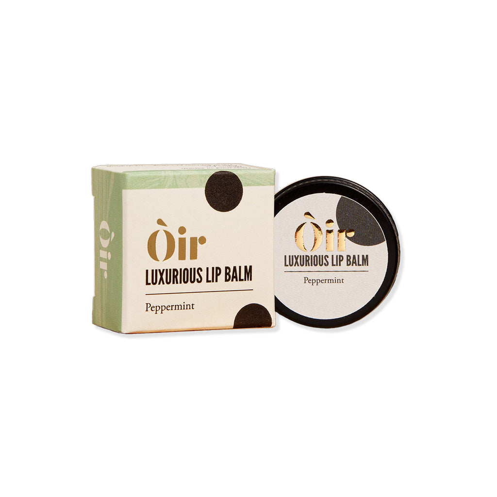 Oir luxurious lip balm with packaging on a white background