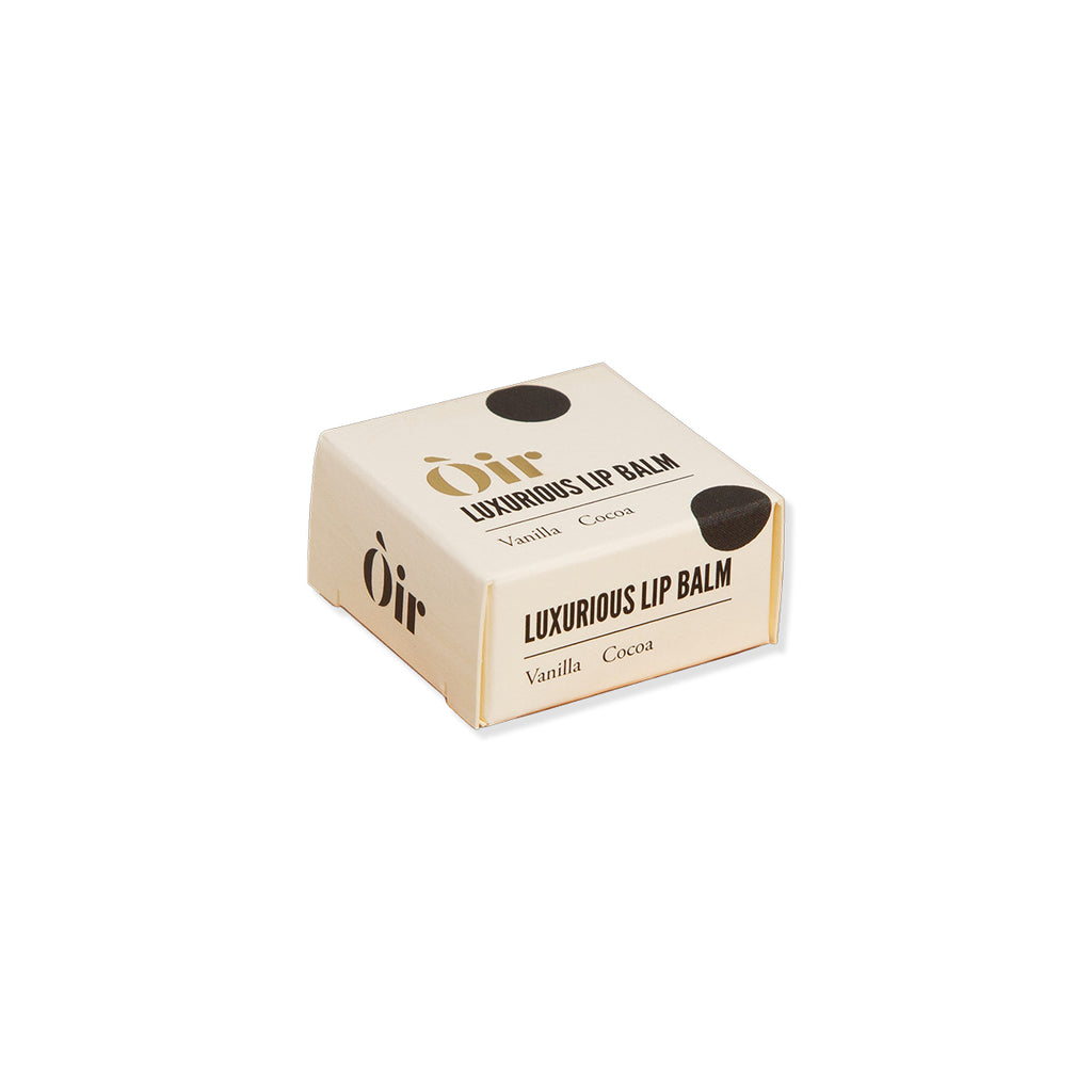 Oir Luxurious Lip Balm vanilla scent packaging on a white background