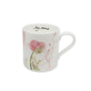 White bone china mug with floral design and 'May Morris' text on a white background