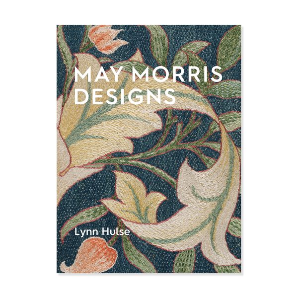 Book cover with floral design and 'May Morris Designs' text on a blue embroidered background