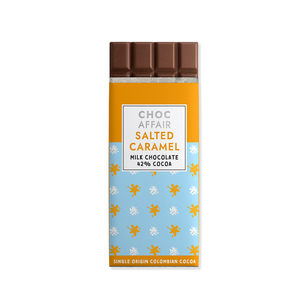 Milk chocolate bar in salted caramel flavour on a white background. 