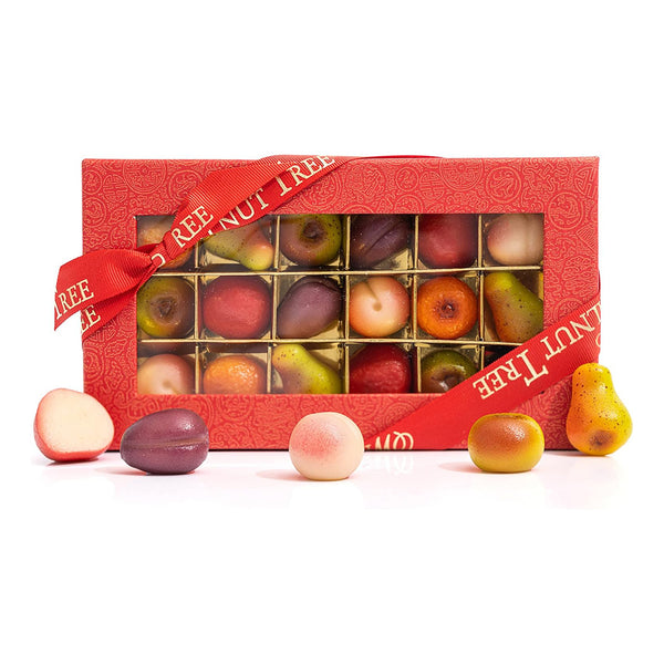 Red gift box containing an assortment of marzipan sweets shaped like fruits 