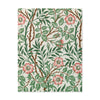 A rectangular A2 notecard of Morris & Co. wallpaper panel featuring a classic botanical pattern of green leaves, thorny brown branches, and pink rose-like flowers on an off-white background.