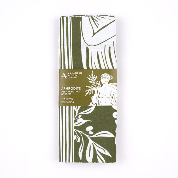 Olive green and white cotton tea towel with Aphrodite goddess pattern with olive branches on a white background.