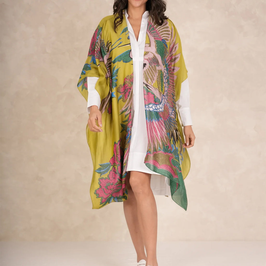 Model wearing olive green crane throwover.