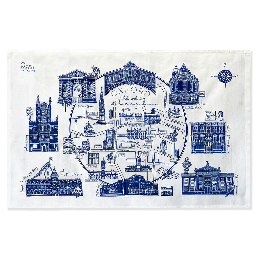 Tea towel with blue architectural illustrations of Oxford on a white background