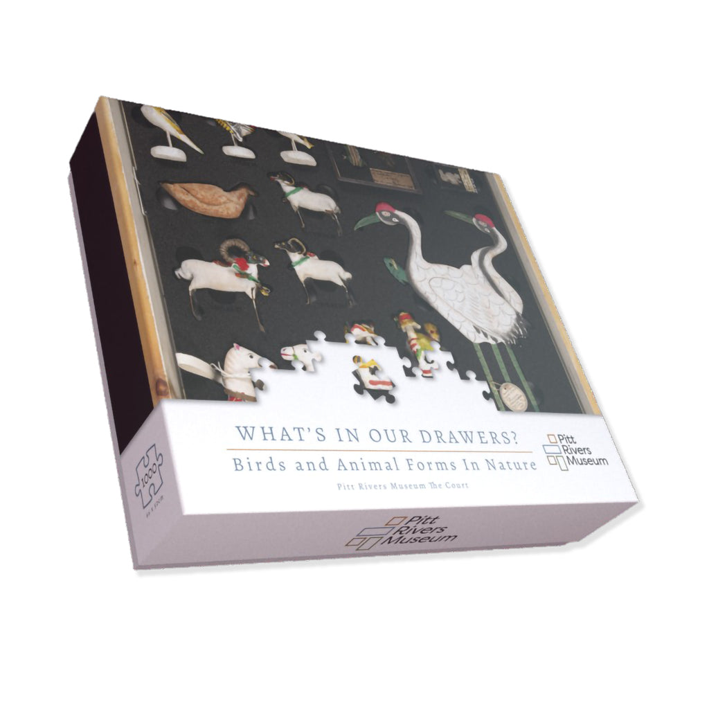 Jigsaw puzzle box with illustrations of animals and text on a white background