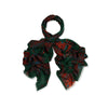 Green and red wool scarf on a white background