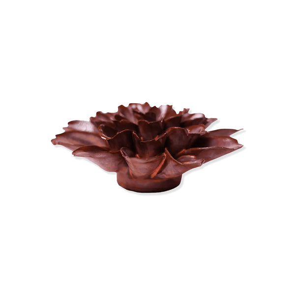 Red and brown ceramic flower-shaped object on a white background