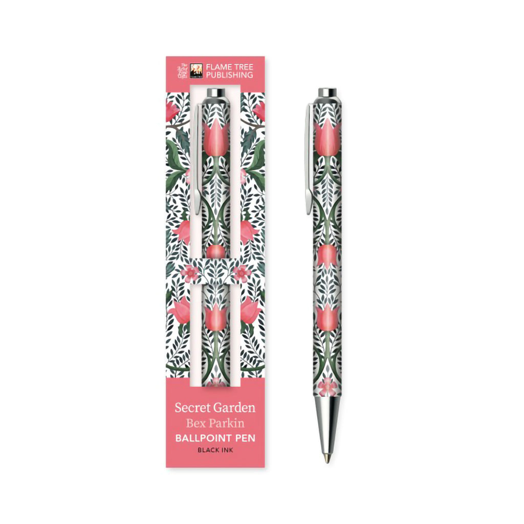 A decorative ballpoint pen with a black, white, and pink floral pattern, shown both inside its pink packaging sleeve and standing upright next to it on a white background.