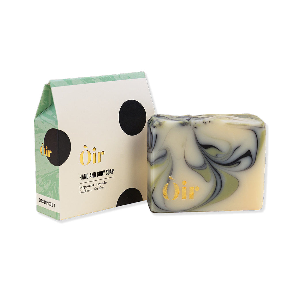 Hand and body soap with packaging on a white background