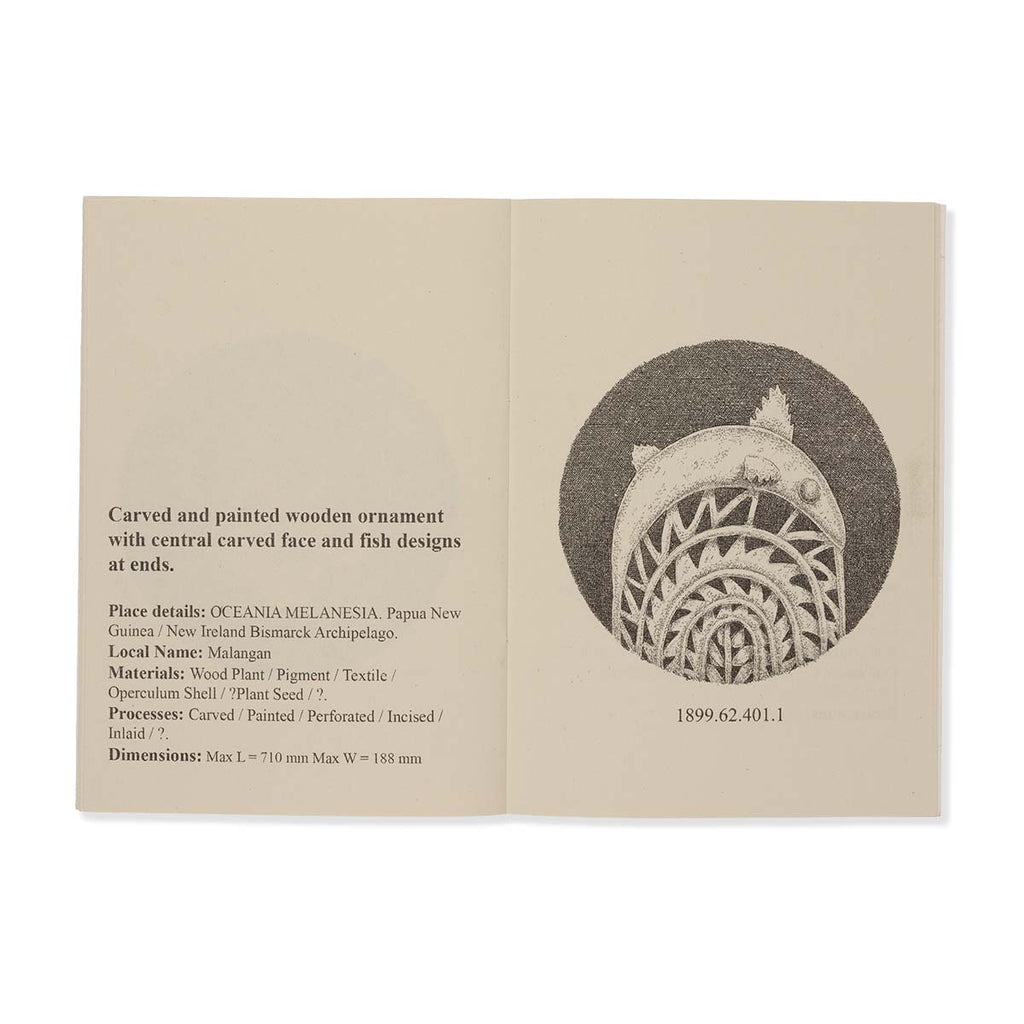 Open book with text and illustration of a carved wooden ornament on beige background