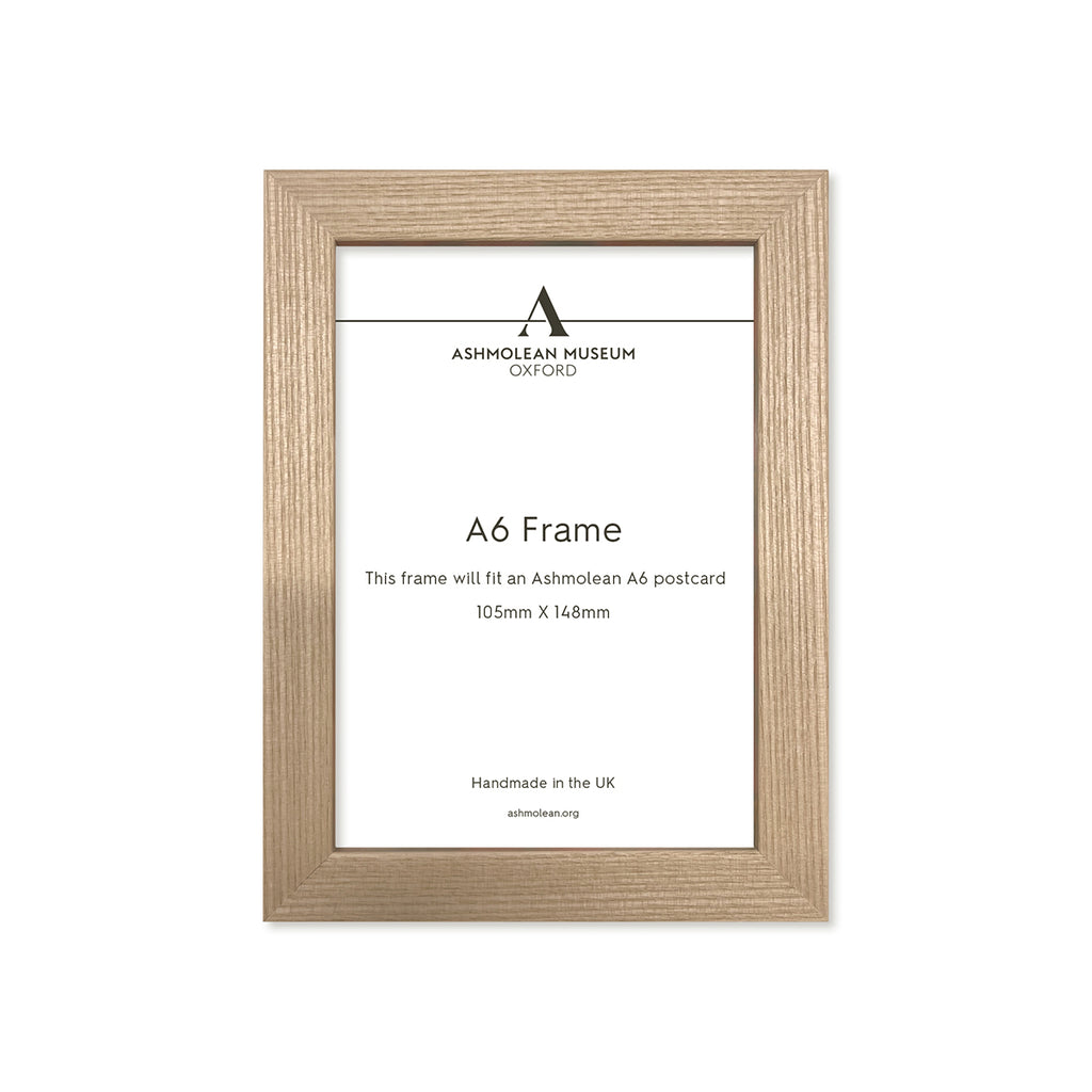 Wooden picture frame with Ashmolean Museum label on a white background