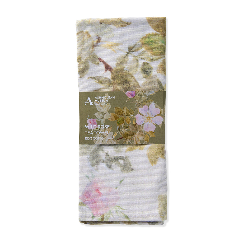 Floral tea towel with packaging on a white background