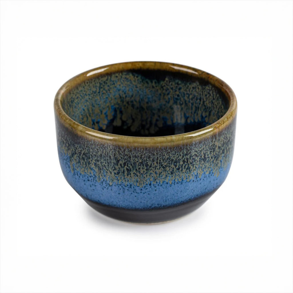 Ceramic small sake drinking cup bowl with blue and brown gradient on a white background