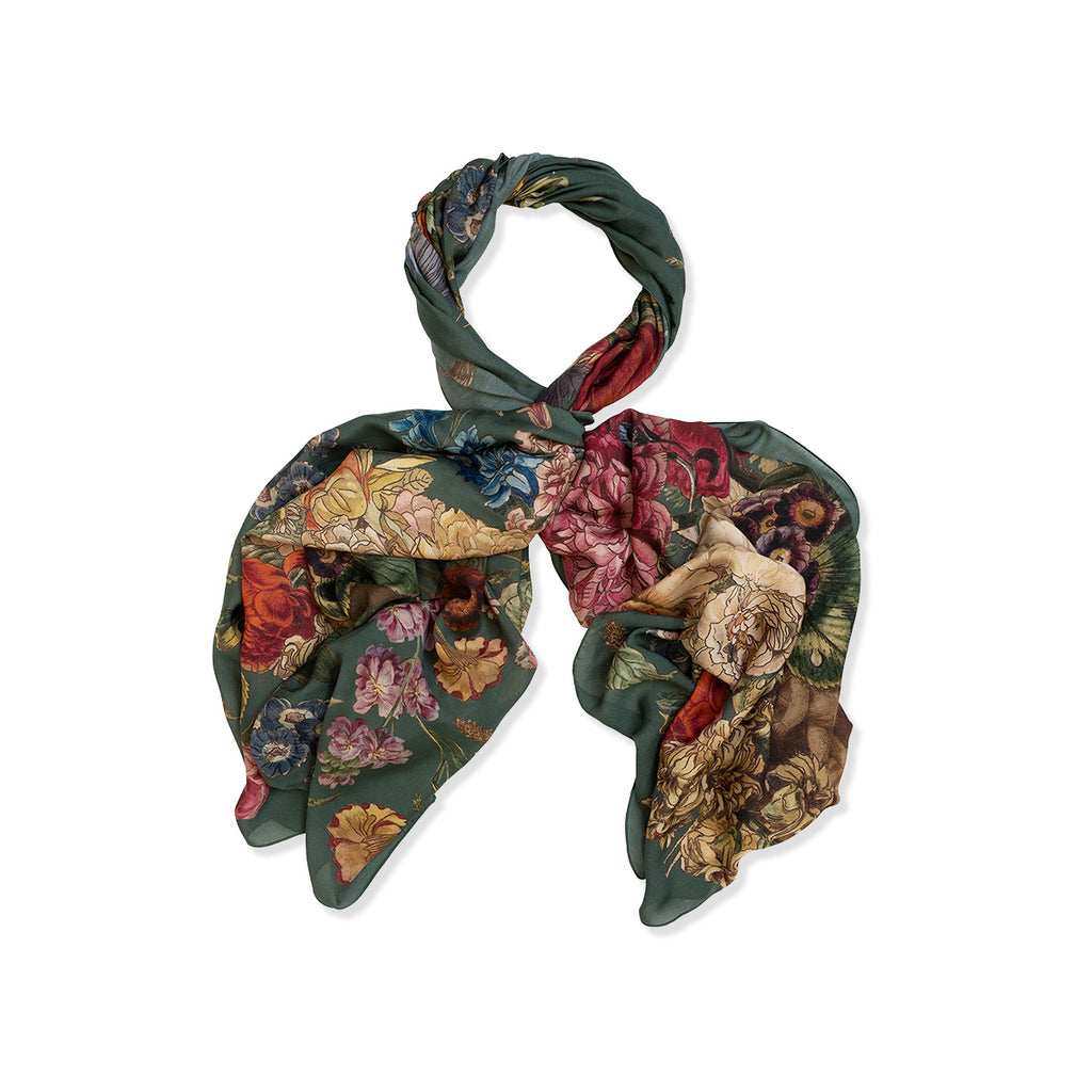 Floral patterned scarf tied in a knot on a white background