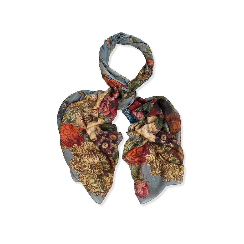 Decorative scarf with floral and classical design on a white background