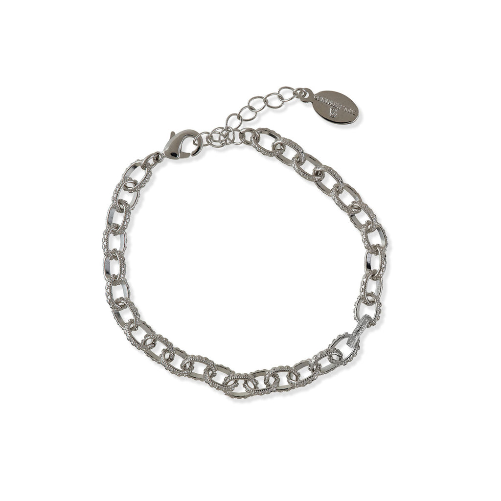 A silver metal charm bracelet on a white background.