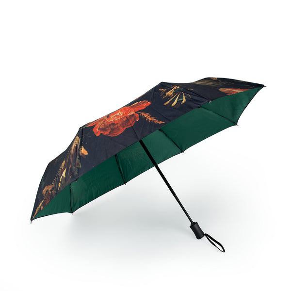 Floral-patterned umbrella on a white background