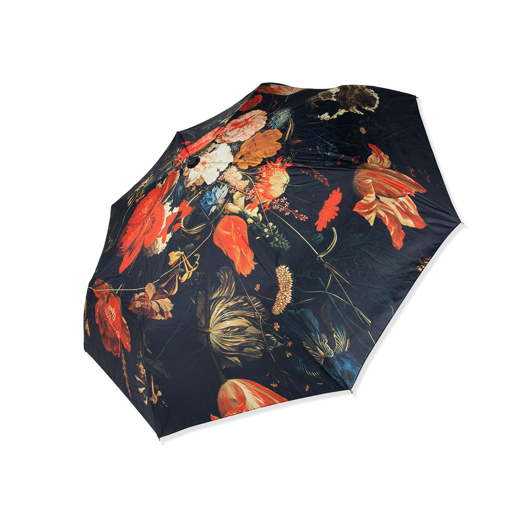 Floral-patterned umbrella on a white background