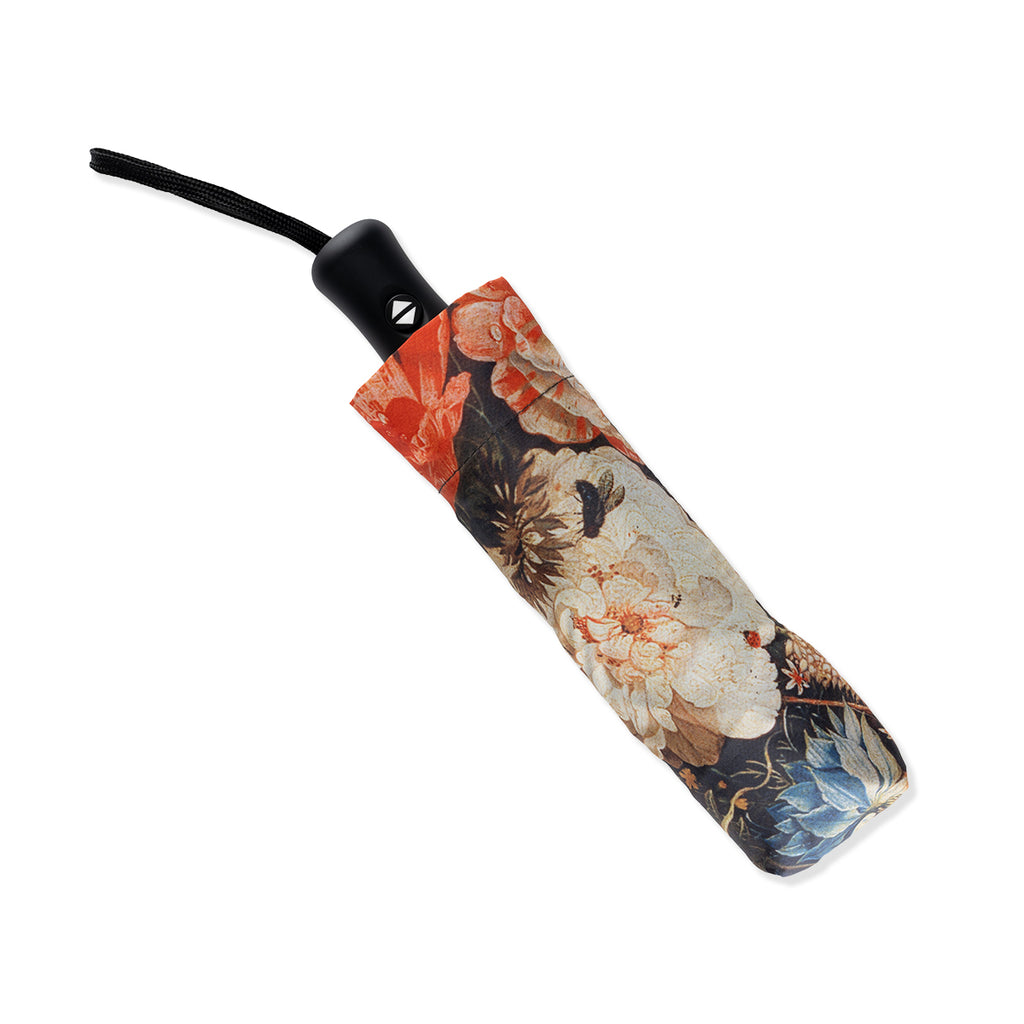 Floral patterned umbrella on a white background