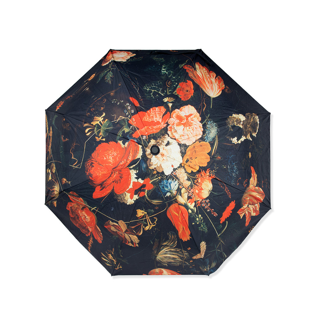 Floral-patterned umbrella on a white background
