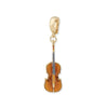 Gold violin-shaped charm on a white background
