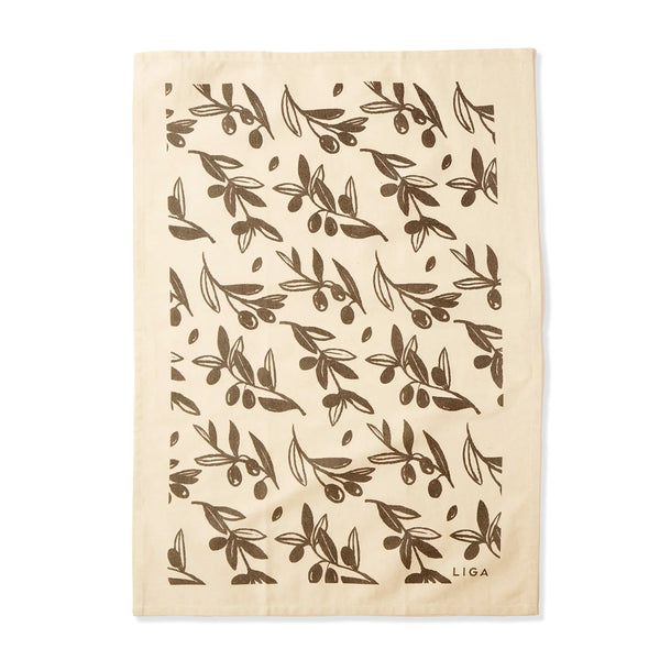 A cream-colored cotton tea towel featuring a repeating dark brown olive branch pattern and the brand name 'LIGA' printed in the bottom right corner, shown flat against a white background.