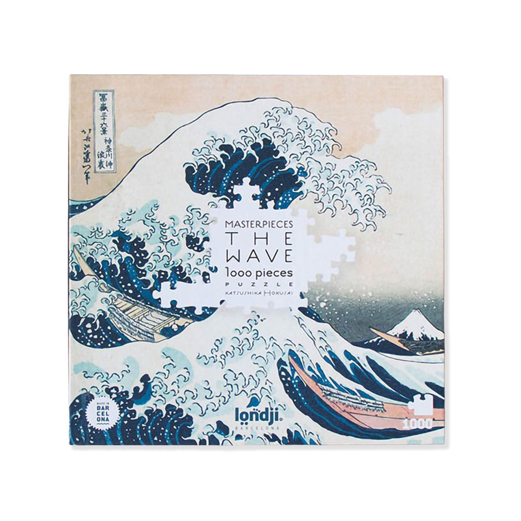 Puzzle box with wave design and 'Masterpieces The Wave' text on a beige background