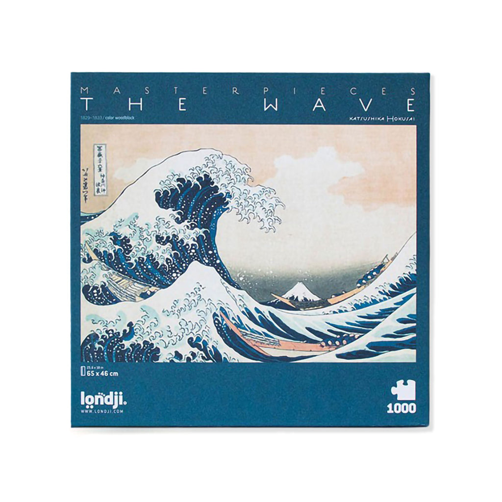 Back of jigsaw box for the wave puzzle, featuring print of wave artwork on a blue cardboard background.