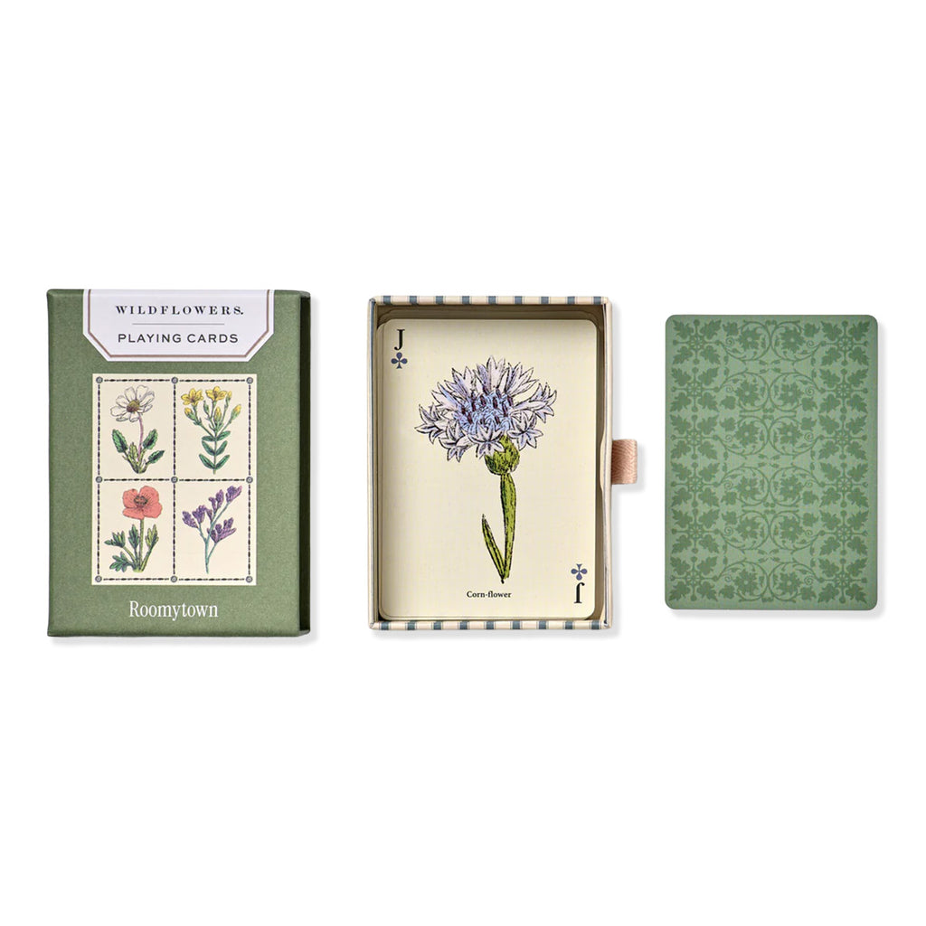 Open pack of wildflower playing cards with Jack of Clubs shown with cornflower illustrated artwork on card and green patterned backing on a white background. 
