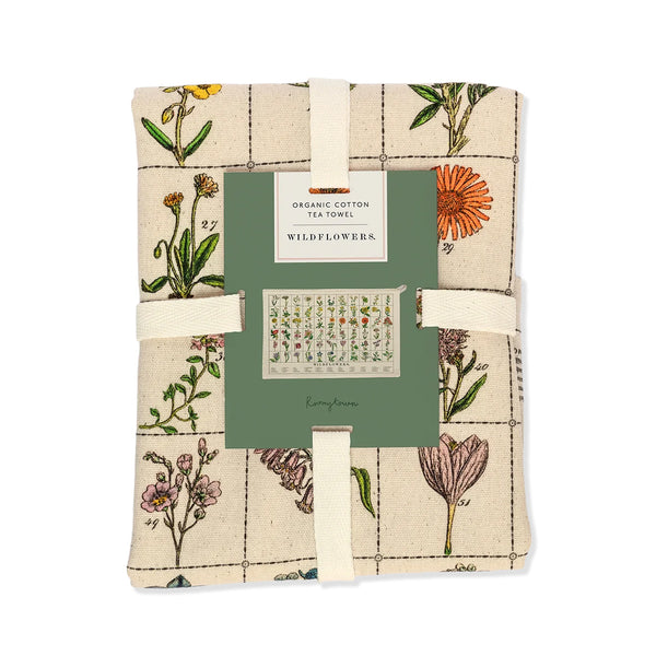Organic cotton beige tea towel with English wildflower illustrations in colour as decoration, on a white background.