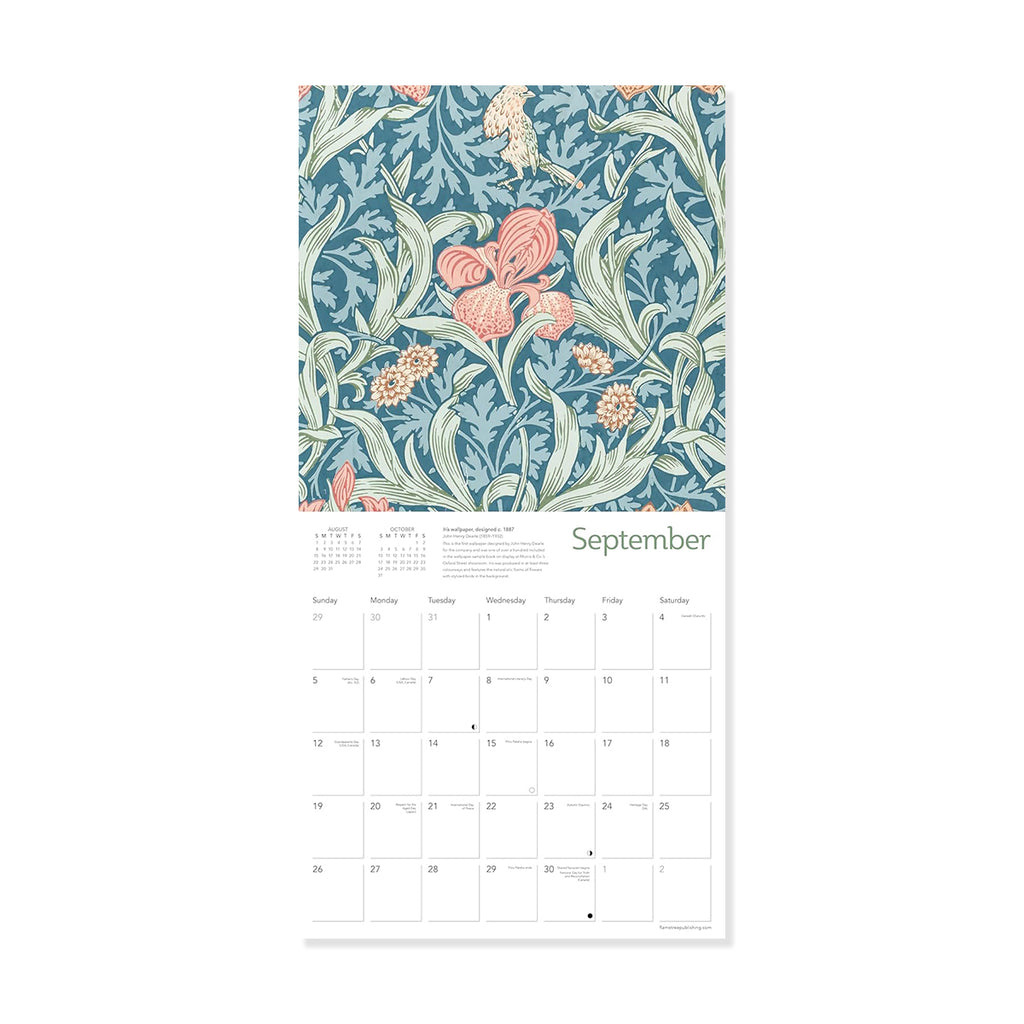 Floral patterned calendar with a blue background and pink flowers on a white background