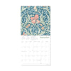 Floral patterned calendar with a blue background and pink flowers on a white background