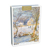Packaging for Christmas Charity cards featuring a winter landscape painting.