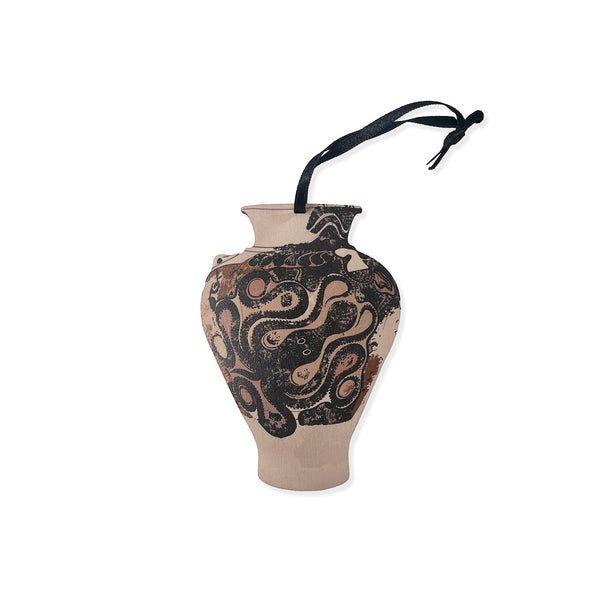 Wooden decoration of ancient Greek vase with octopus design.