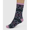 Sock with a floral fair isle pattern on a white background