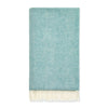 Wool throw in green/blue herringbone pattern with white tasselled edges on a white background.