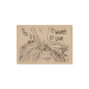 Wooden postcard with a tree design and text 'The Tree Speaks, Its Wounds, Its Love' on a white background