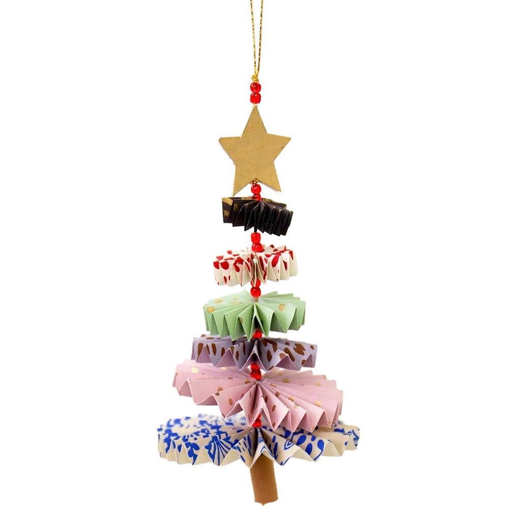 A hanging Christmas tree ornament made from layered paper fan shapes in pastel colors, topped with a gold star and red beads, suspended by a gold string on a white background.