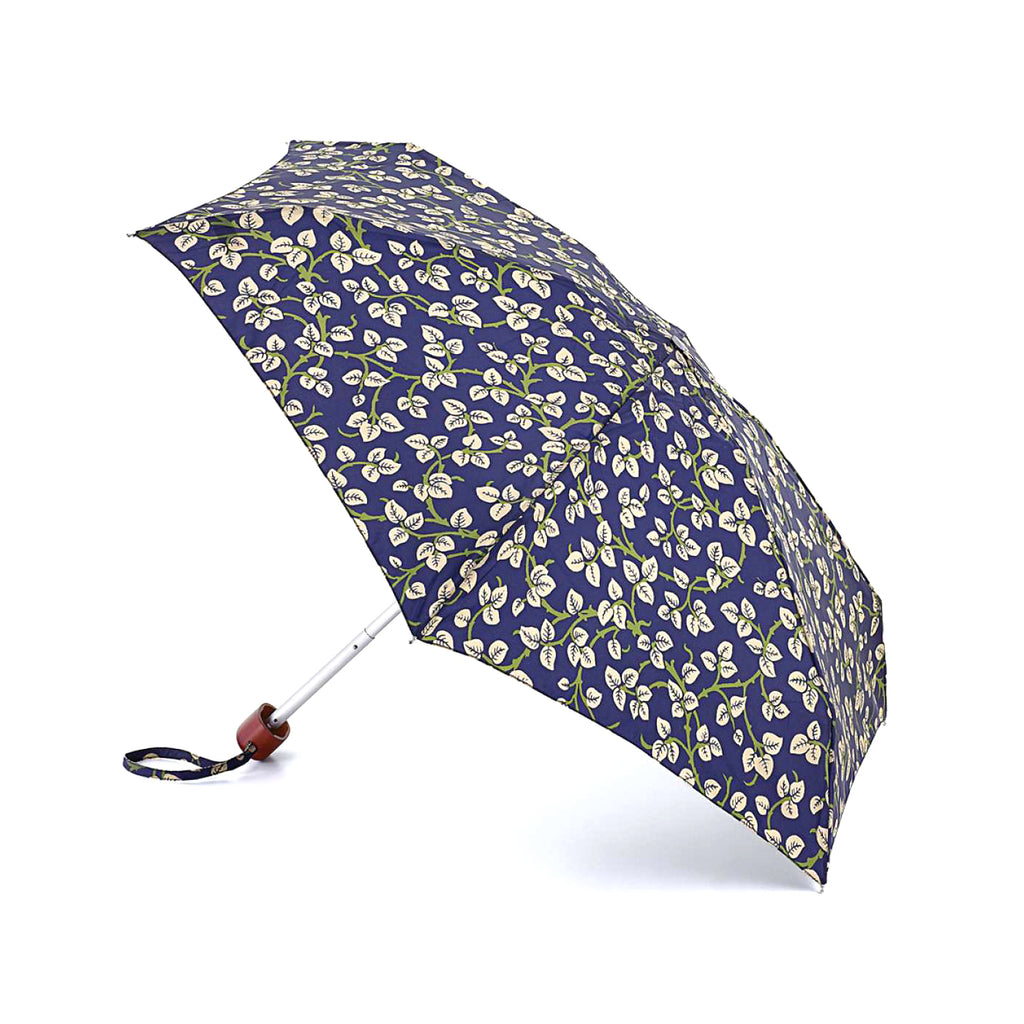 This compact and flat umbrella features a Merton leaf pattern in cream and green over a purple canopy